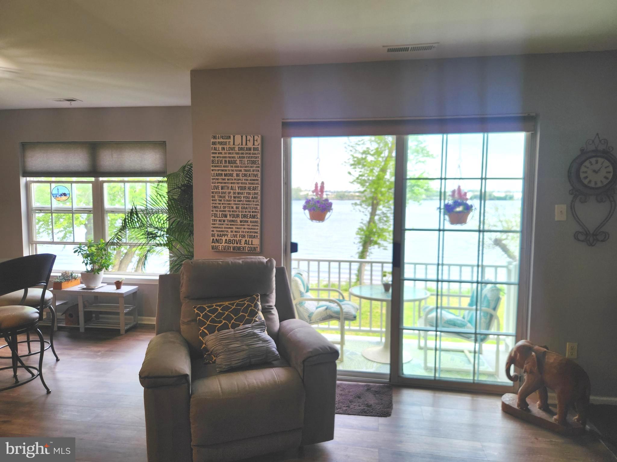 5201 Riverfront Drive Palmyra, NJ 08065 - Photo 11 of 13 a living room with furniture and a large window