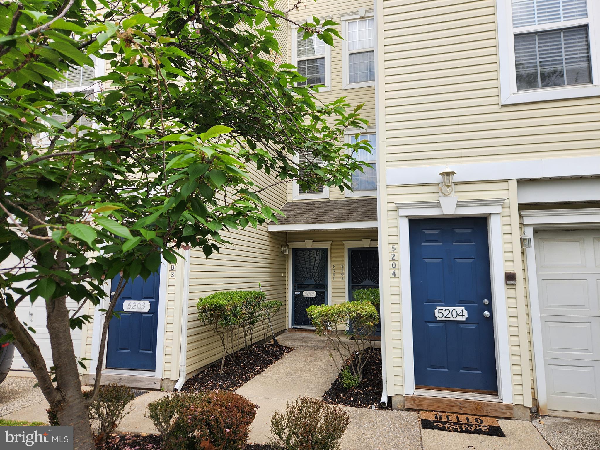 5201 Riverfront Drive Palmyra, NJ 08065 - Photo 3 of 13 a front view of a house with garden