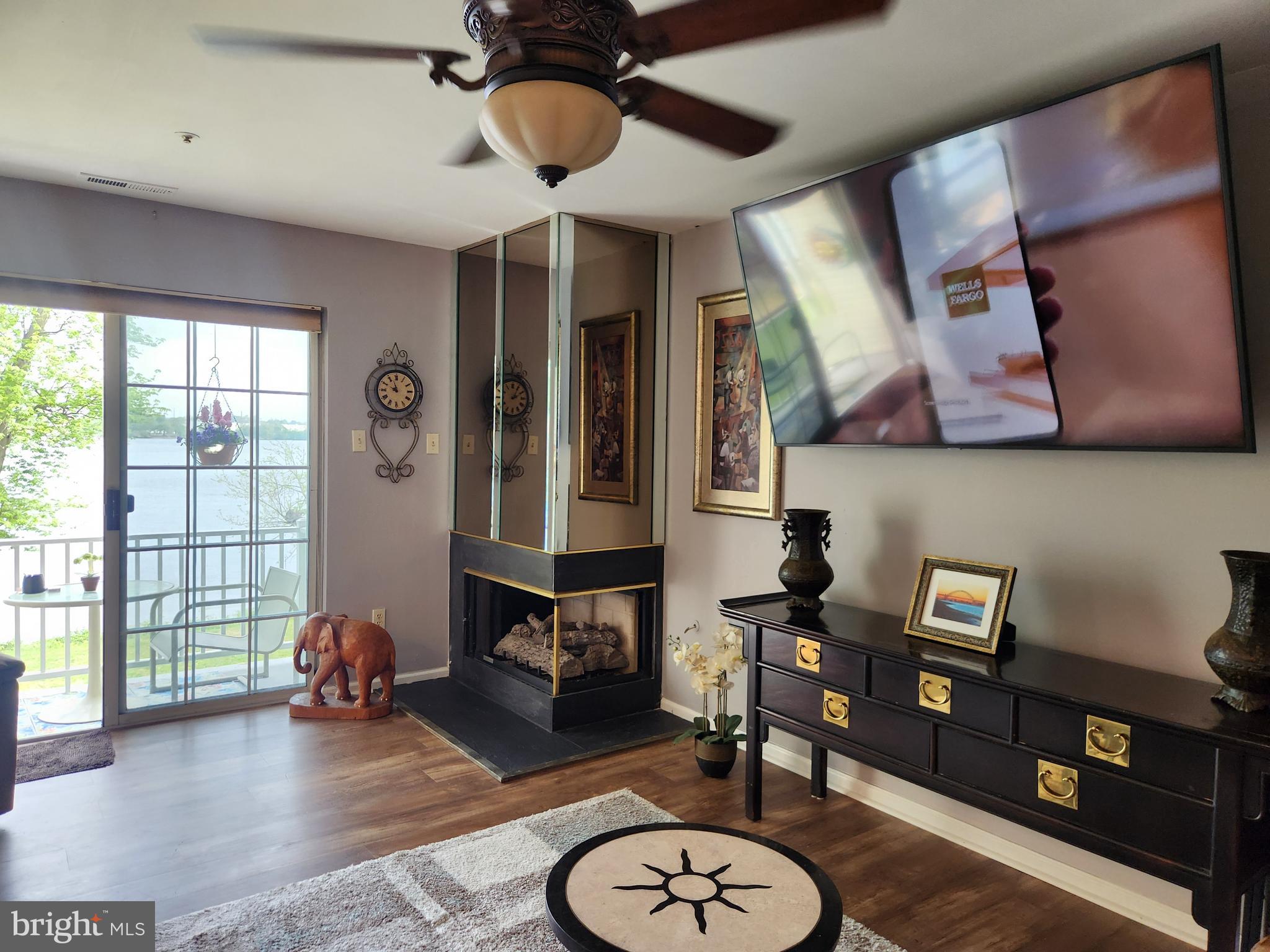 5201 Riverfront Drive Palmyra, NJ 08065 - Photo 7 of 13 a view of a livingroom with furniture and a ceiling fan