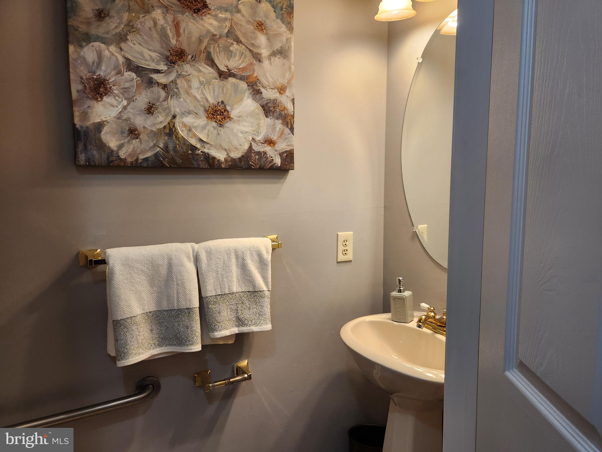 5201 Riverfront Drive Palmyra, NJ 08065 - Photo 9 of 13 a bathroom with a sink and a mirror