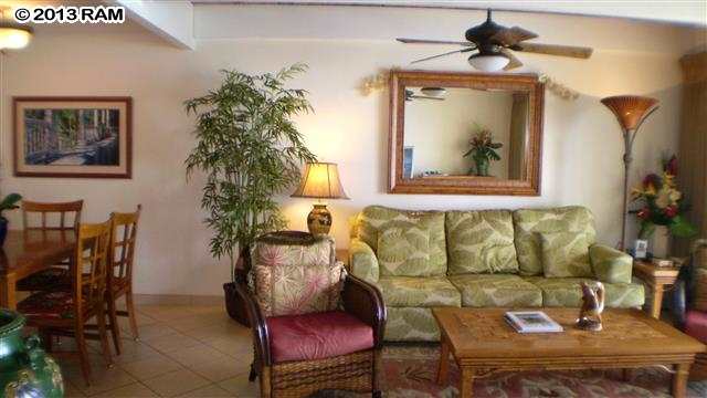 3833 Lower Honoapiilani Road, Unit A203 Lahaina, HI 96761 - Photo 16 of 26 a living room with furniture and a potted plant