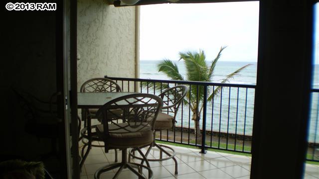 3833 Lower Honoapiilani Road, Unit A203 Lahaina, HI 96761 - Photo 20 of 26 a view of a balcony with furniture
