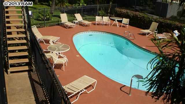 3833 Lower Honoapiilani Road, Unit A203 Lahaina, HI 96761 - Photo 25 of 26 an aerial view of a pool patio swimming pool and outdoor seating