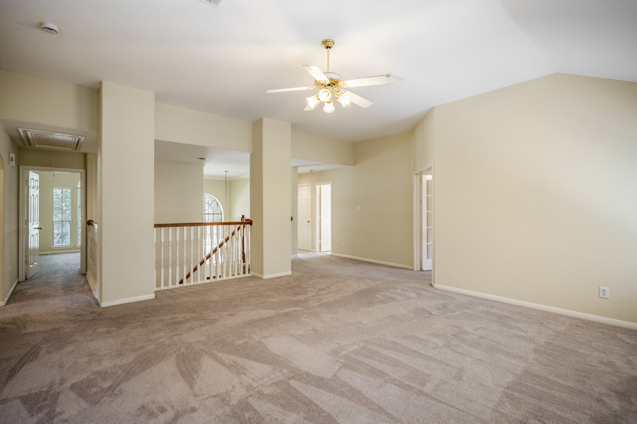 5807 Sequoia Trace Court Spring, TX 77379 - Photo 20 of 50 Upstairs, the game room creates a spacious central hangout with bedrooms branching off nearby, giving the second floor its own flexible living area separate from the main level.