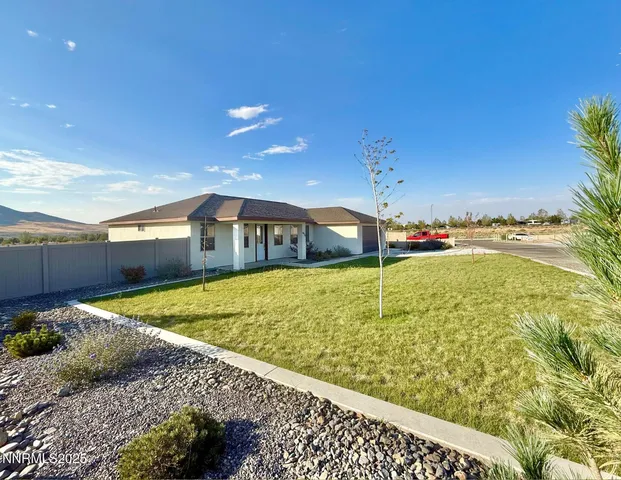a house with trees in front of it