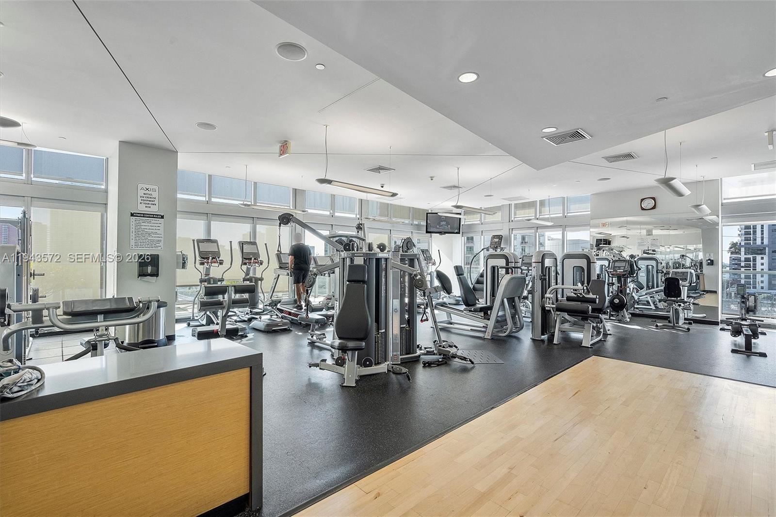 79 Southwest 12th Street, Unit 3809S Miami, FL 33130 - Photo 19 of 21 a view of a room with gym equipment