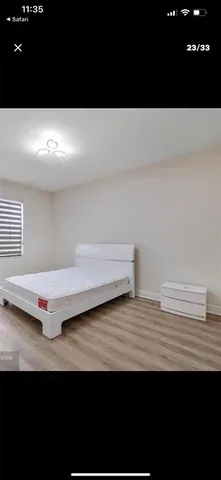 a view of kitchen island with granite countertop