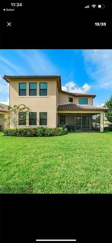 a view of a kitchen with furniture and a kitchen