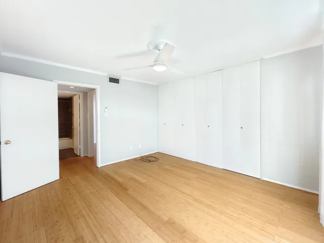 a view of a swimming pool with a lounge chair