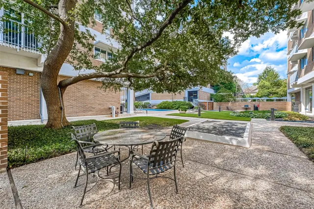 a bedroom with furniture and window