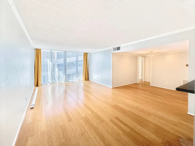 a bathroom with a sink mirror toilet and bathtub