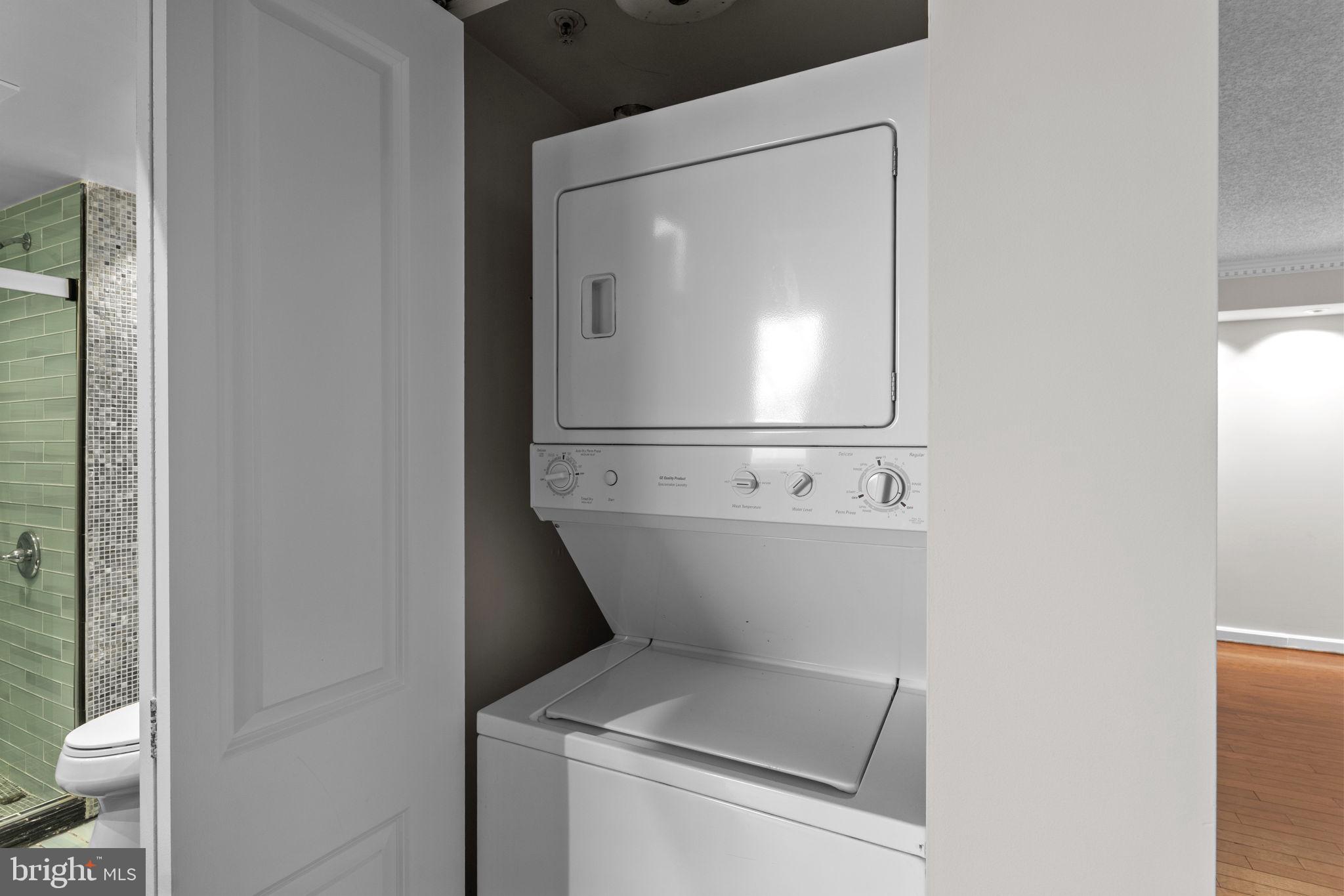 880 North Pollard Street, Unit 224 Arlington, VA 22203 - Photo 19 of 39 a utility room with dryer and washer