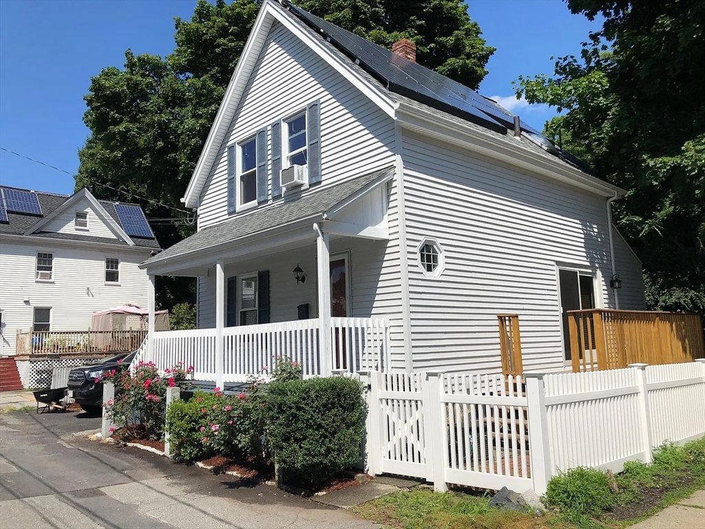 a front view of a house with a porch