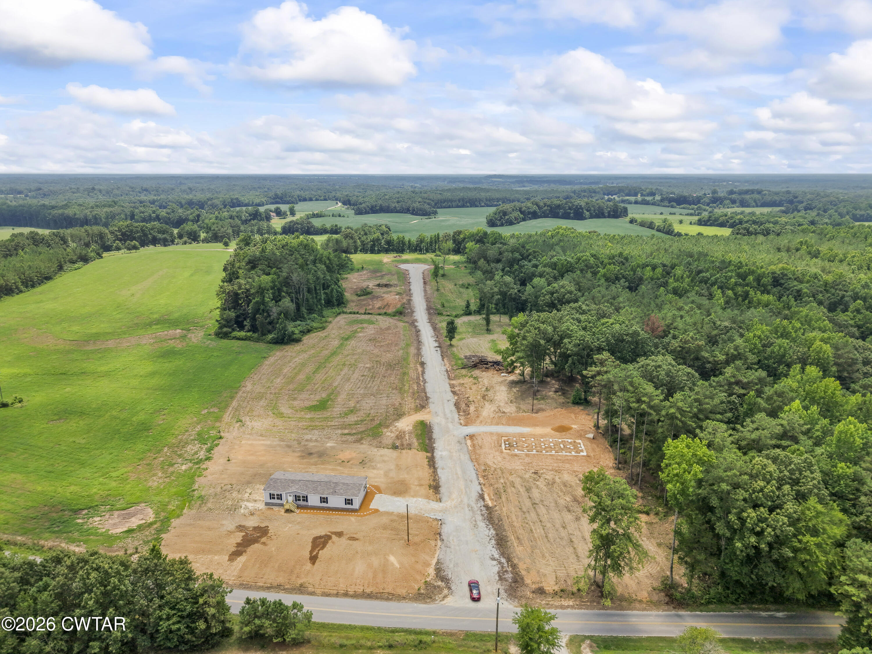 3045 Clifford Road Henderson, TN 38340 - Photo 24 of 28 DJI_20260703131409_0100_D