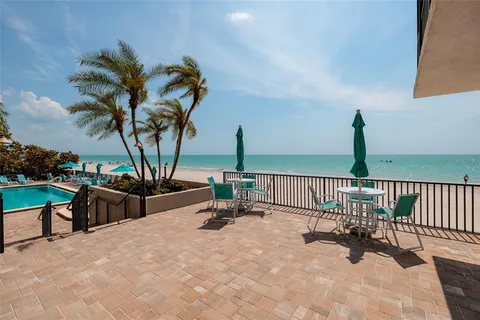 a view of a terrace with chairs