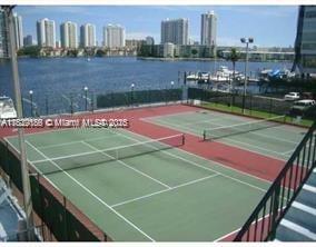 2750 Northeast 183rd Street, Unit 1701 Aventura, FL 33160 - Photo 27 of 40 a view of a tennis court