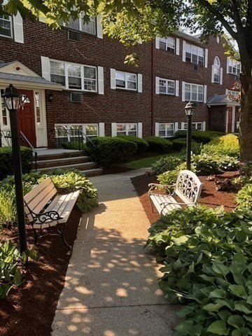 15 Cass Street, Unit 3 Boston, MA 02132 - Photo 23 of 24 a view of a house with a yard