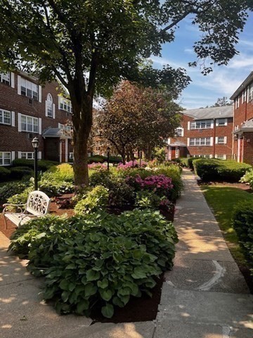 15 Cass Street, Unit 3 Boston, MA 02132 - Photo 24 of 24 a view of a garden with a fountain