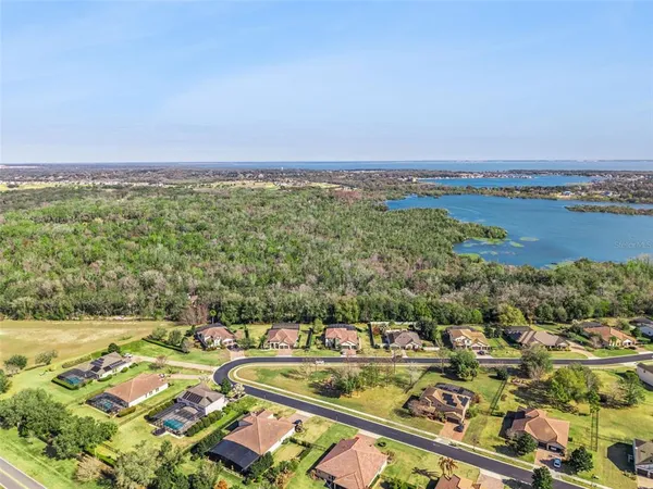a view of a lake with a yard
