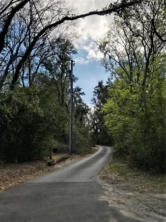 a view of a road with a yard
