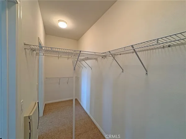a refrigerator freezer sitting inside of a kitchen
