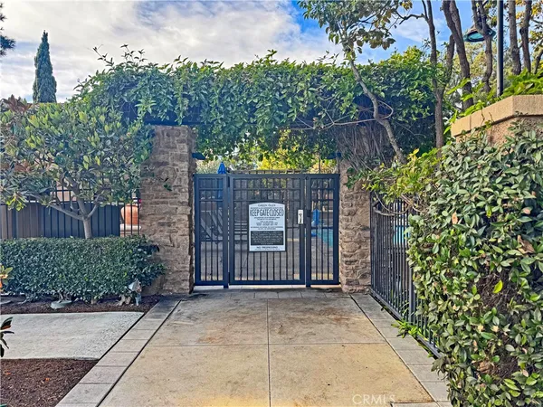a view of a backyard with sitting area