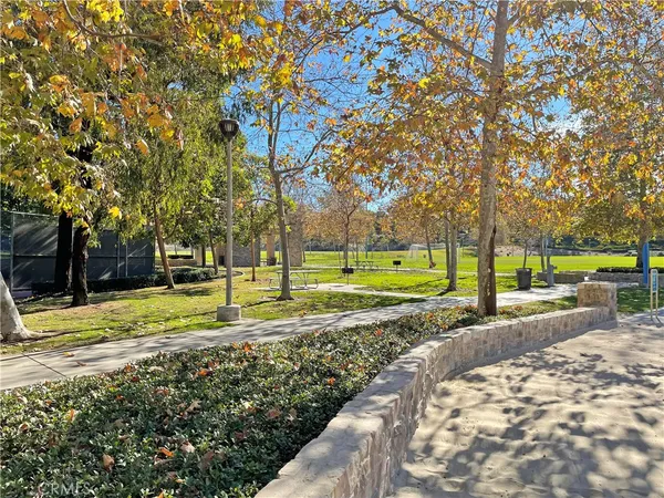 a view of a house next to a yard