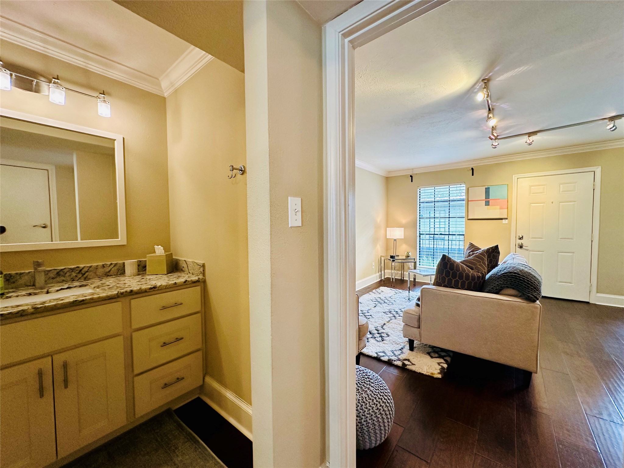 3402 Garrott Street, Unit 16 Houston, TX 77006 - Photo 24 of 47 a en suite bathroom with a double vanity sink and a mirror