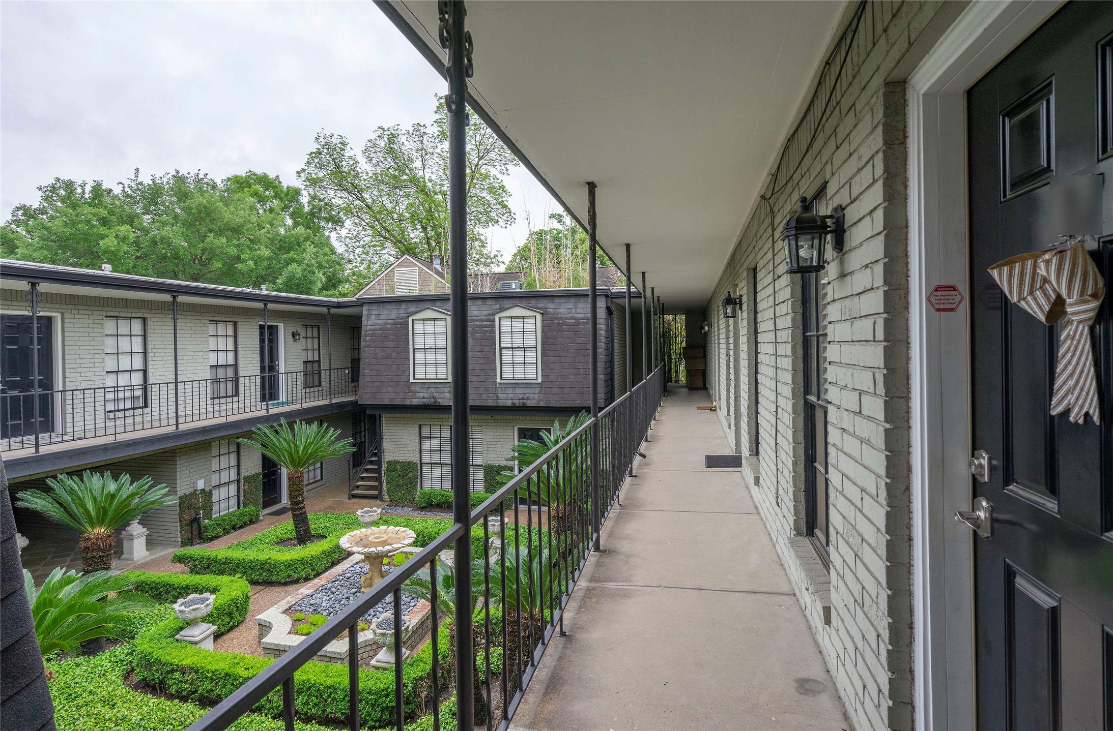 3402 Garrott Street, Unit 16 Houston, TX 77006 - Photo 30 of 47 a view of a balcony