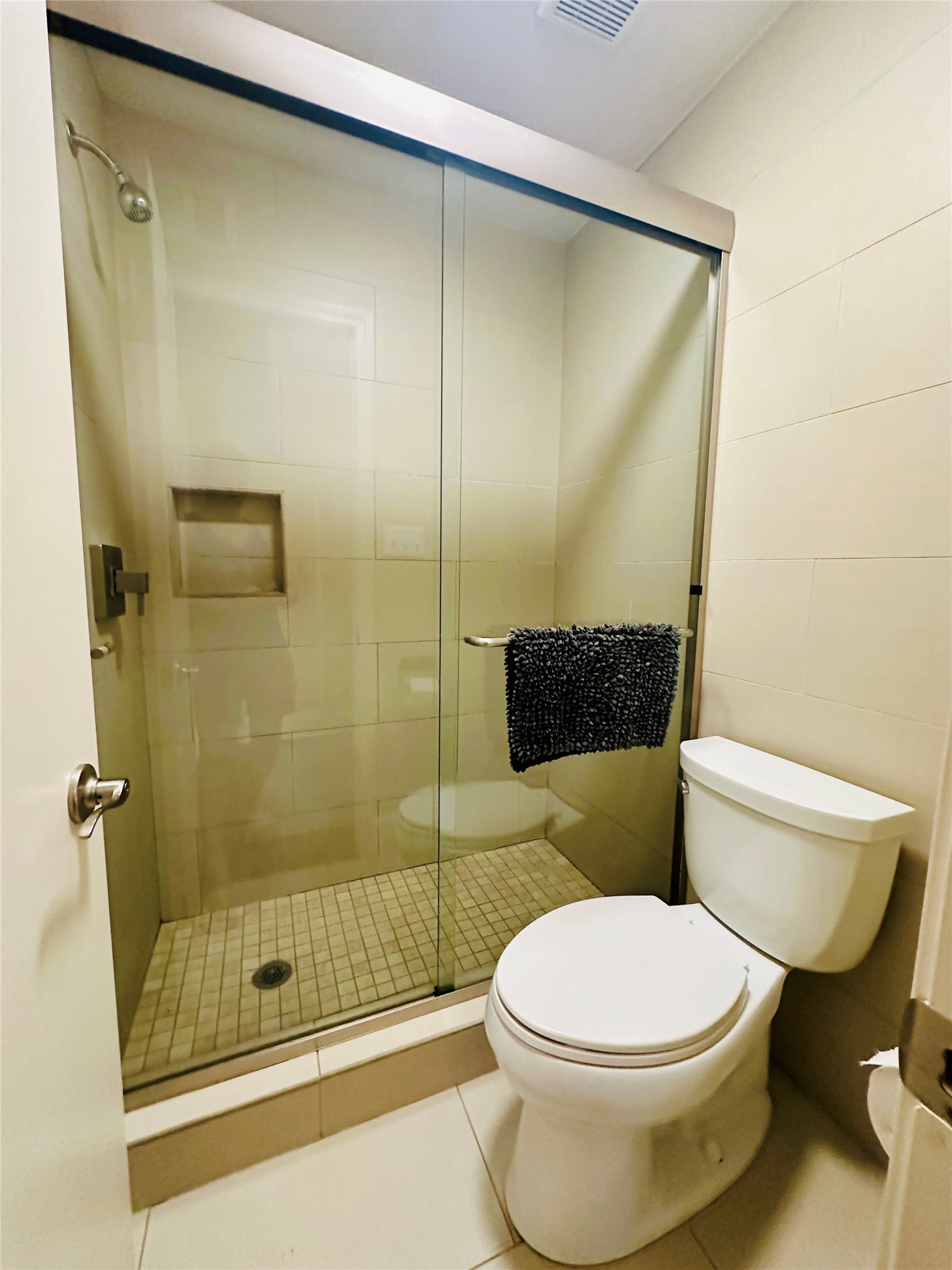 3402 Garrott Street, Unit 16 Houston, TX 77006 - Photo 10 of 47 a bathroom with a toilet and a shower