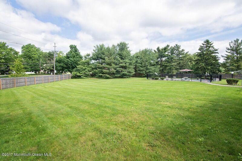 800 Waterworks Road Freehold, NJ 07728 - Photo 27 of 28 a view of a big yard with plants and large trees