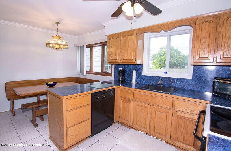 800 Waterworks Road Freehold, NJ 07728 - Photo 10 of 28 a kitchen with a sink and a stove