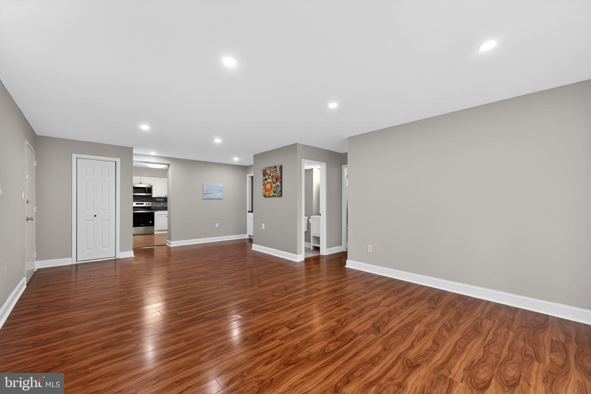 400 Glendale Road, Unit F35 Havertown, PA 19083 - Photo 10 of 36 a view of an empty room with wooden floor and a window
