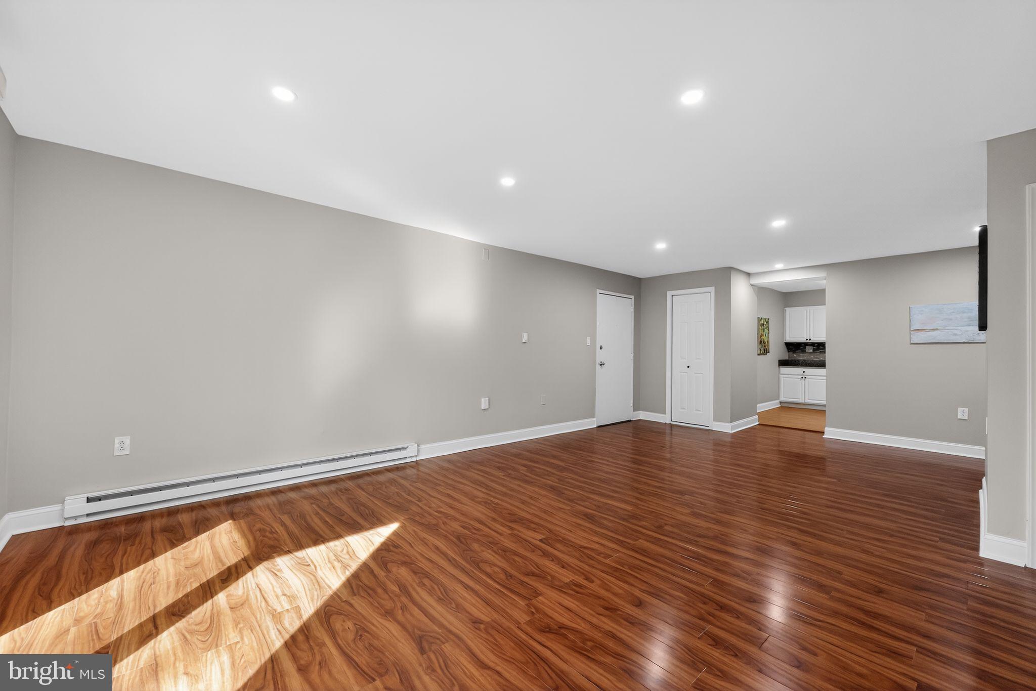 400 Glendale Road, Unit F35 Havertown, PA 19083 - Photo 11 of 36 a view of empty room with wooden floor