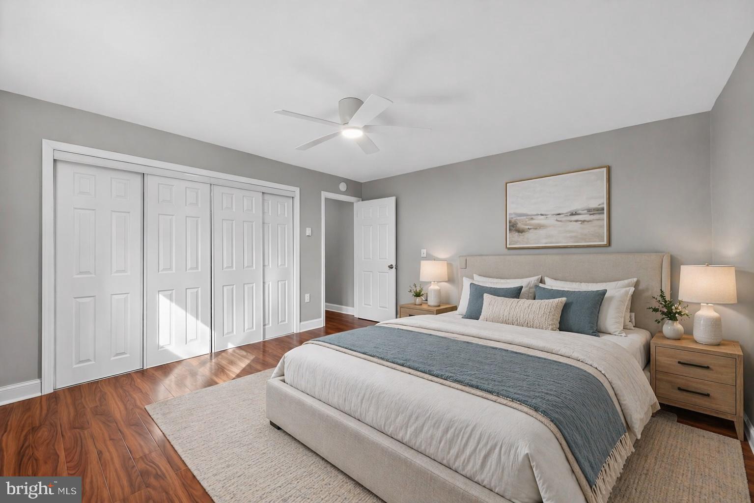 400 Glendale Road, Unit F35 Havertown, PA 19083 - Photo 20 of 36 a bedroom with a large bed and a chandelier