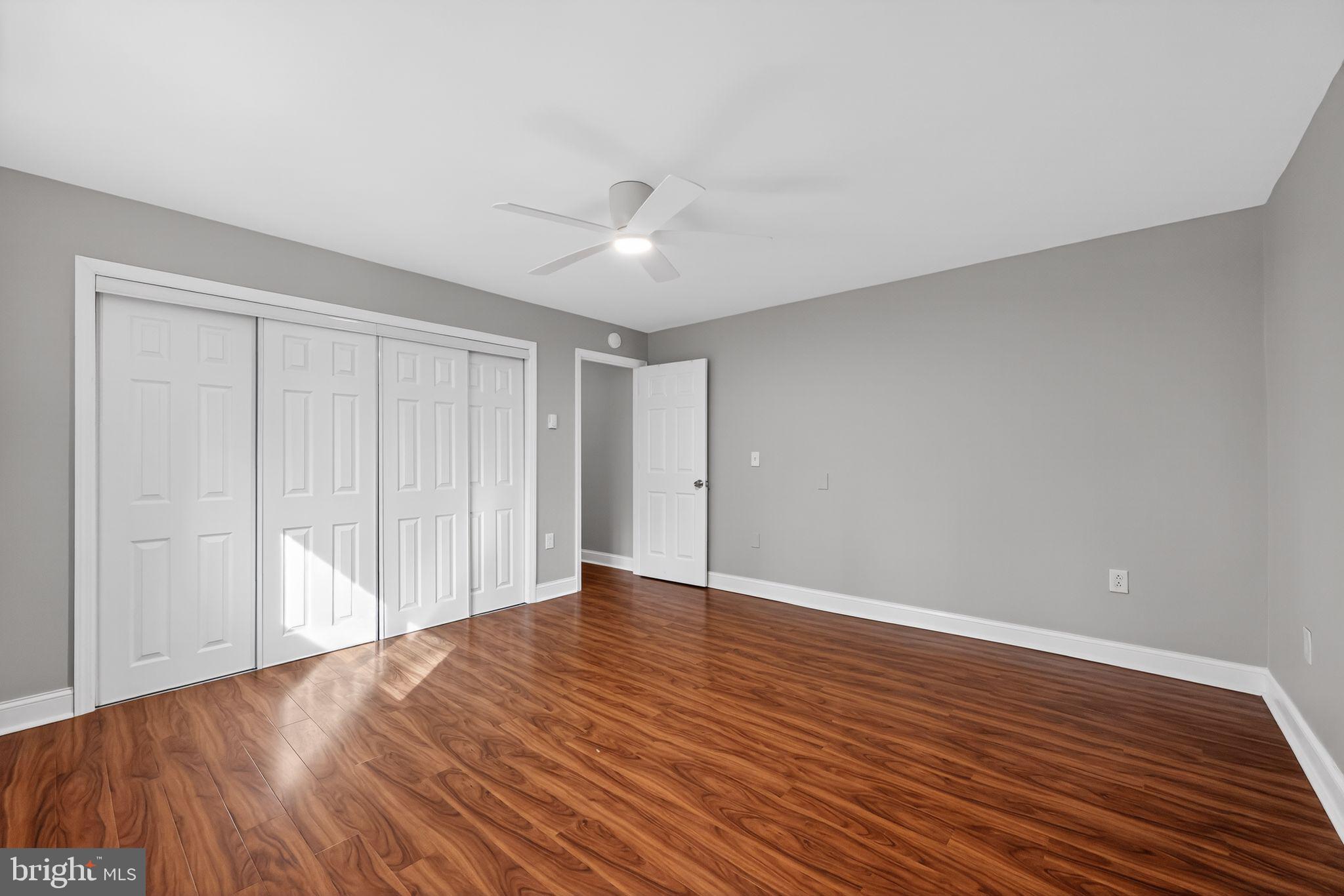 400 Glendale Road, Unit F35 Havertown, PA 19083 - Photo 21 of 36 a view of an empty room with wooden floor