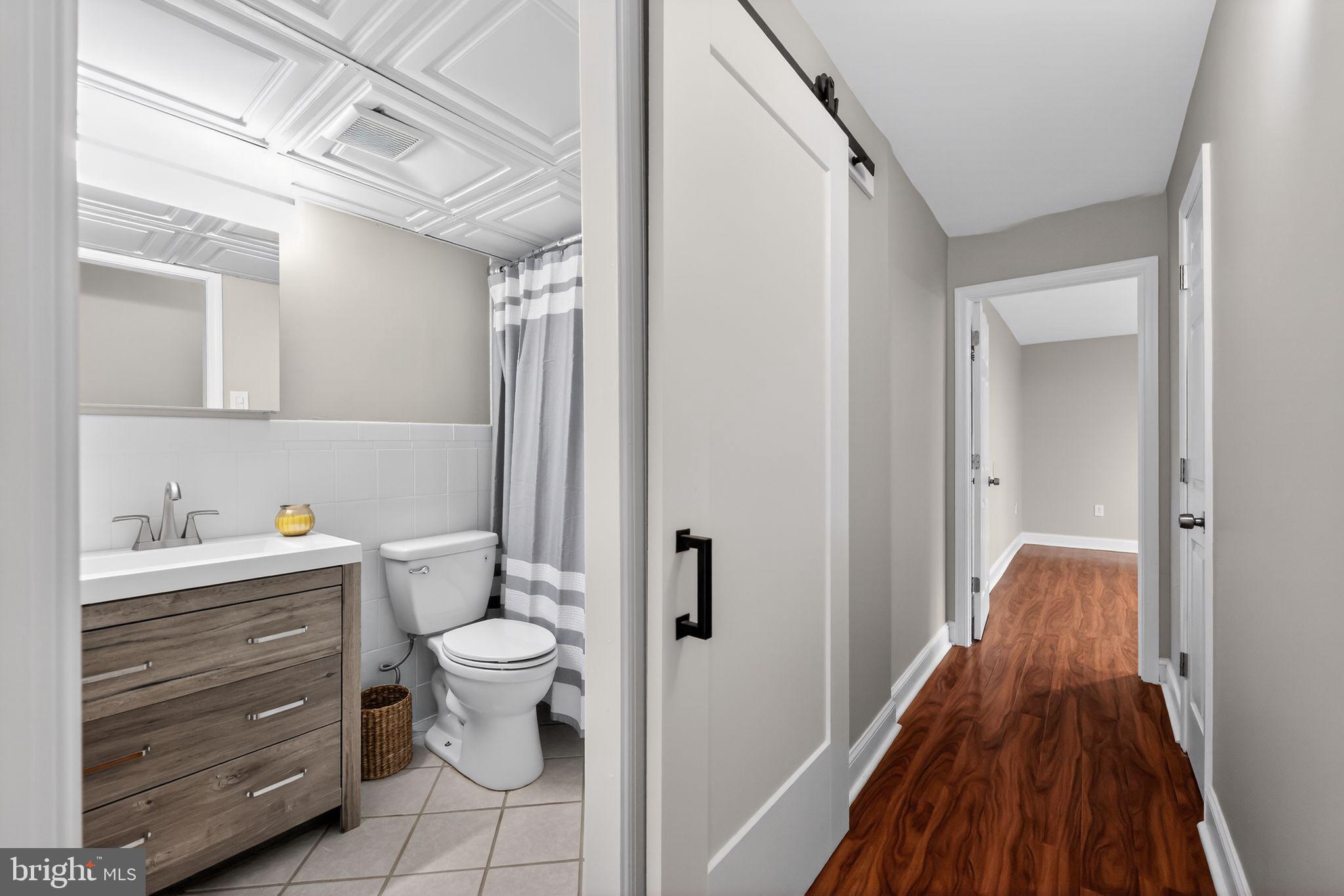 400 Glendale Road, Unit F35 Havertown, PA 19083 - Photo 24 of 36 a bathroom with a toilet and a shower