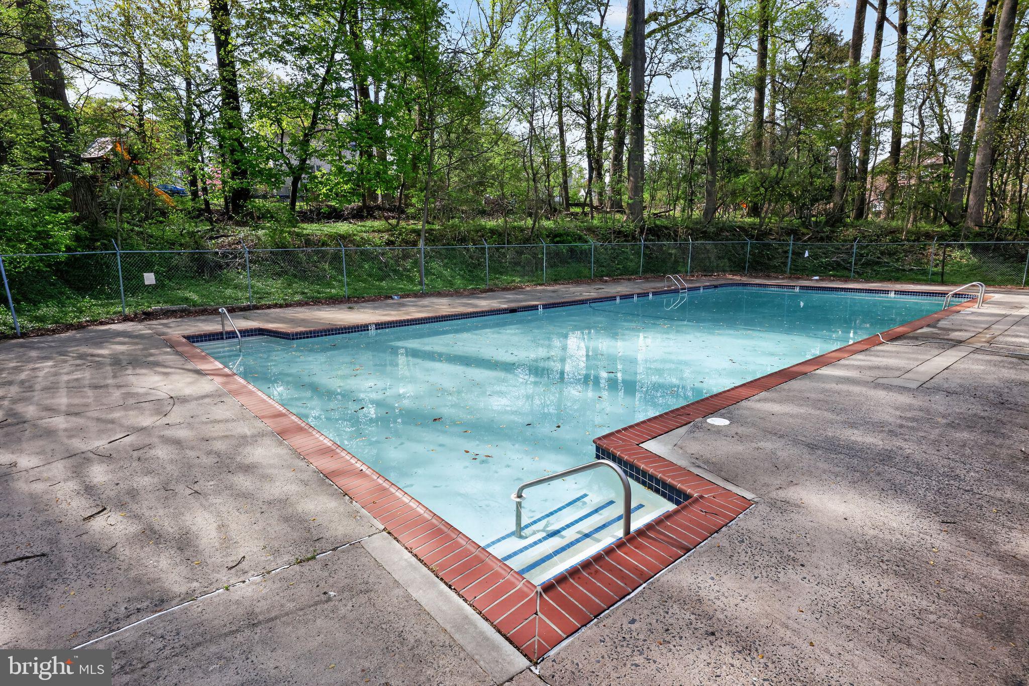 400 Glendale Road, Unit F35 Havertown, PA 19083 - Photo 33 of 36 a view of a backyard with swimming pool