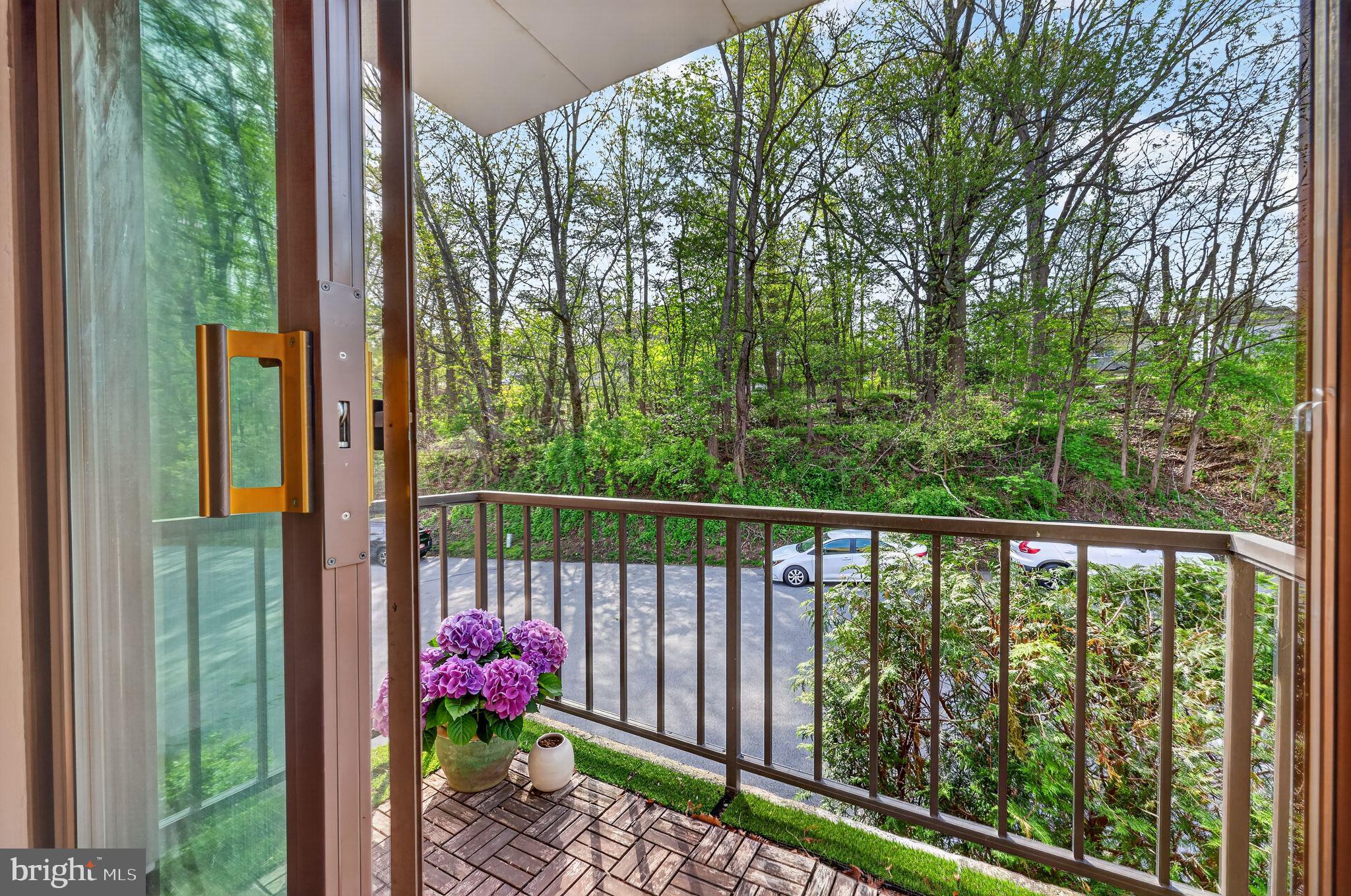 400 Glendale Road, Unit F35 Havertown, PA 19083 - Photo 9 of 36 a view of a balcony with flower plants