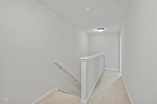 a view of a hallway with closet