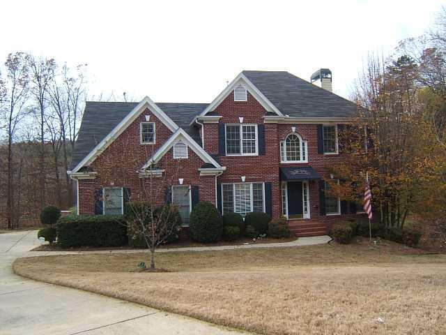 3645 High Point Cumming, GA 30041 - Photo 1 of 1 Exterior Front. 2 Story Traditional with Brick Front and Level Front Yard