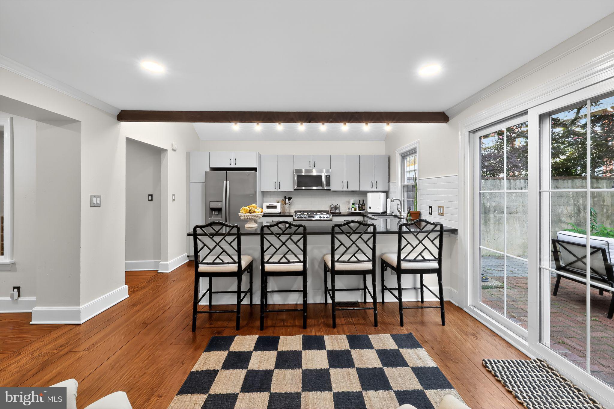10 Rockford Road Wilmington, DE 19806 - Photo 13 of 30 a view of a dining room with furniture and wooden floor