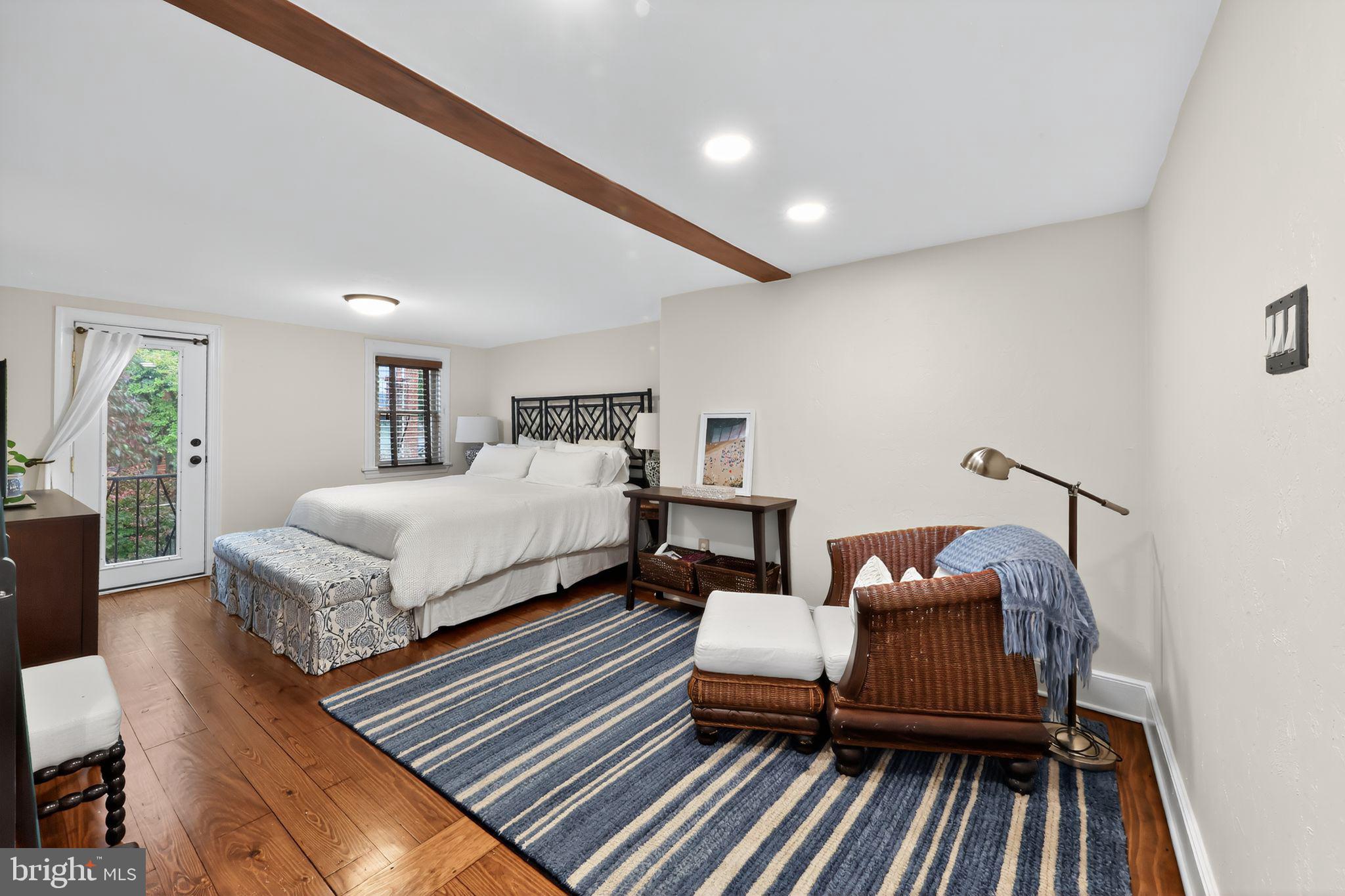 10 Rockford Road Wilmington, DE 19806 - Photo 17 of 30 a bedroom with a bed and wooden floor