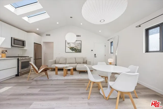 a view of a dining room with furniture