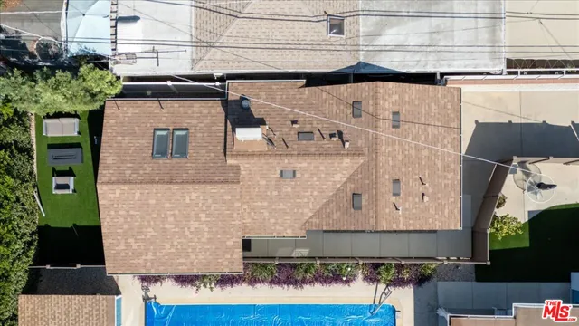 an aerial view of a city with lots of residential buildings