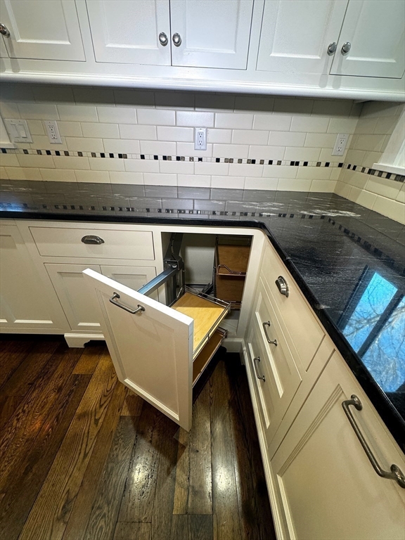 154 Main Street Andover, MA 01810 - Photo 13 of 42 a open kitchen with granite countertop a sink and a stove
