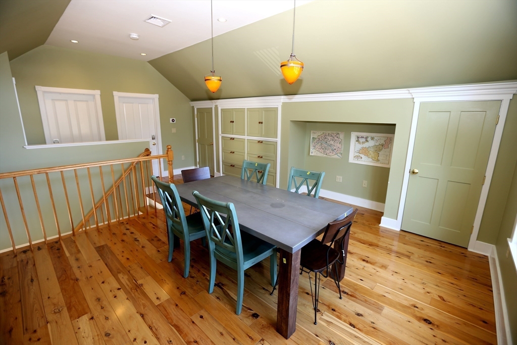 154 Main Street Andover, MA 01810 - Photo 35 of 42 a view of a dining room with furniture and wooden floor