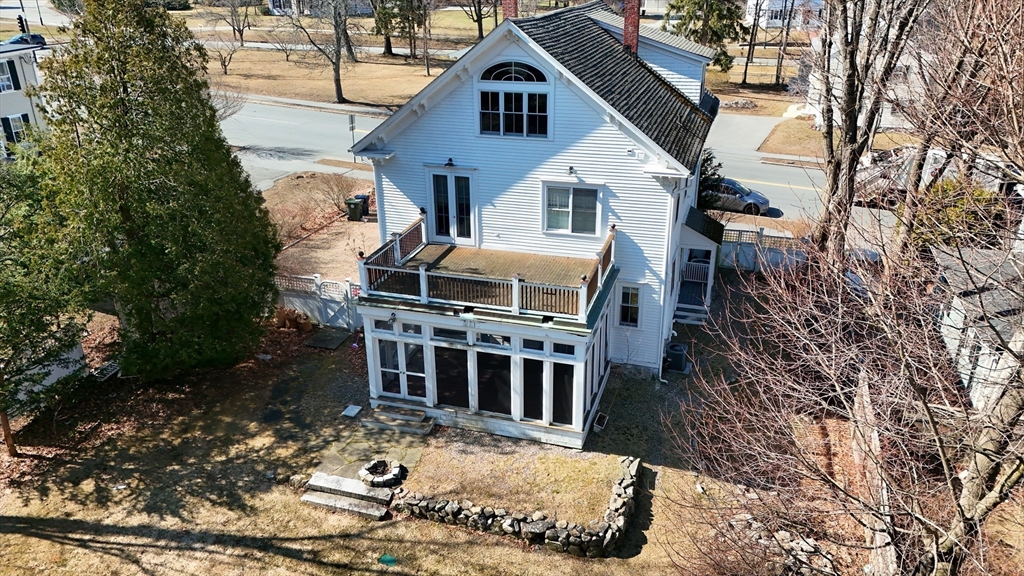 154 Main Street Andover, MA 01810 - Photo 41 of 42 a front view of a house with a yard