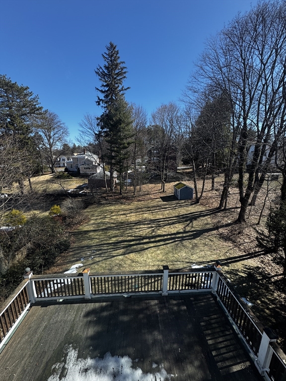 154 Main Street Andover, MA 01810 - Photo 42 of 42 a view of a yard with wooden fence