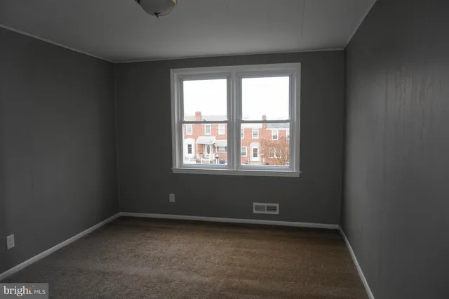 an empty room with a window